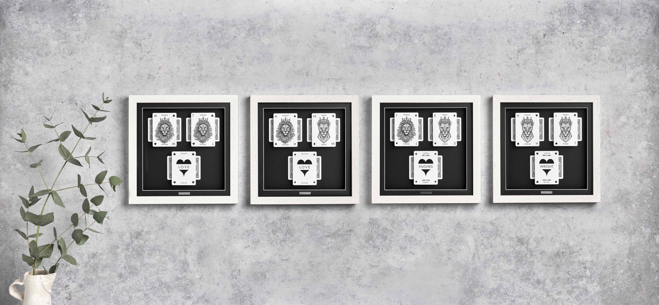 The Regal Lion Collection personalised playing card gift frames with lion and lioness illustrations in black shadow box frames.