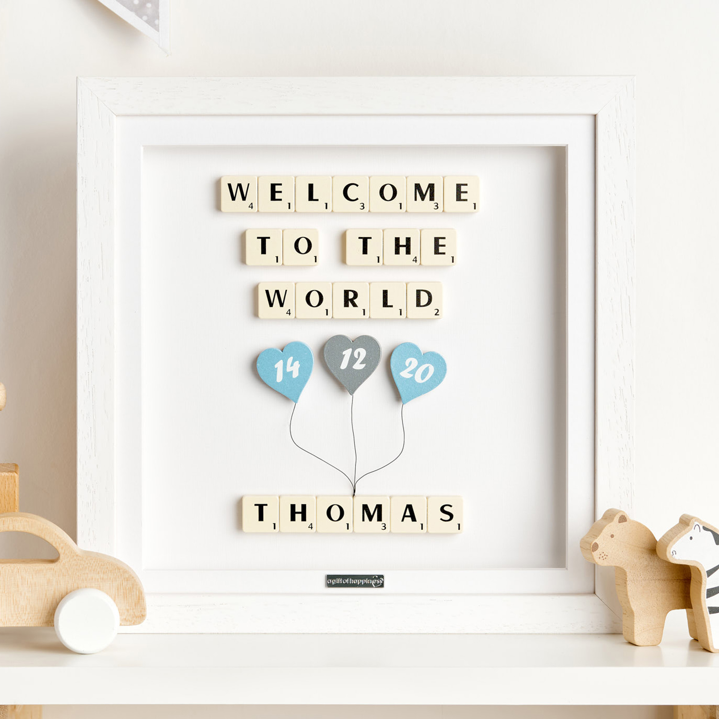 Personalised new baby frame with Scrabble tiles and heart balloons showing birth date and baby name