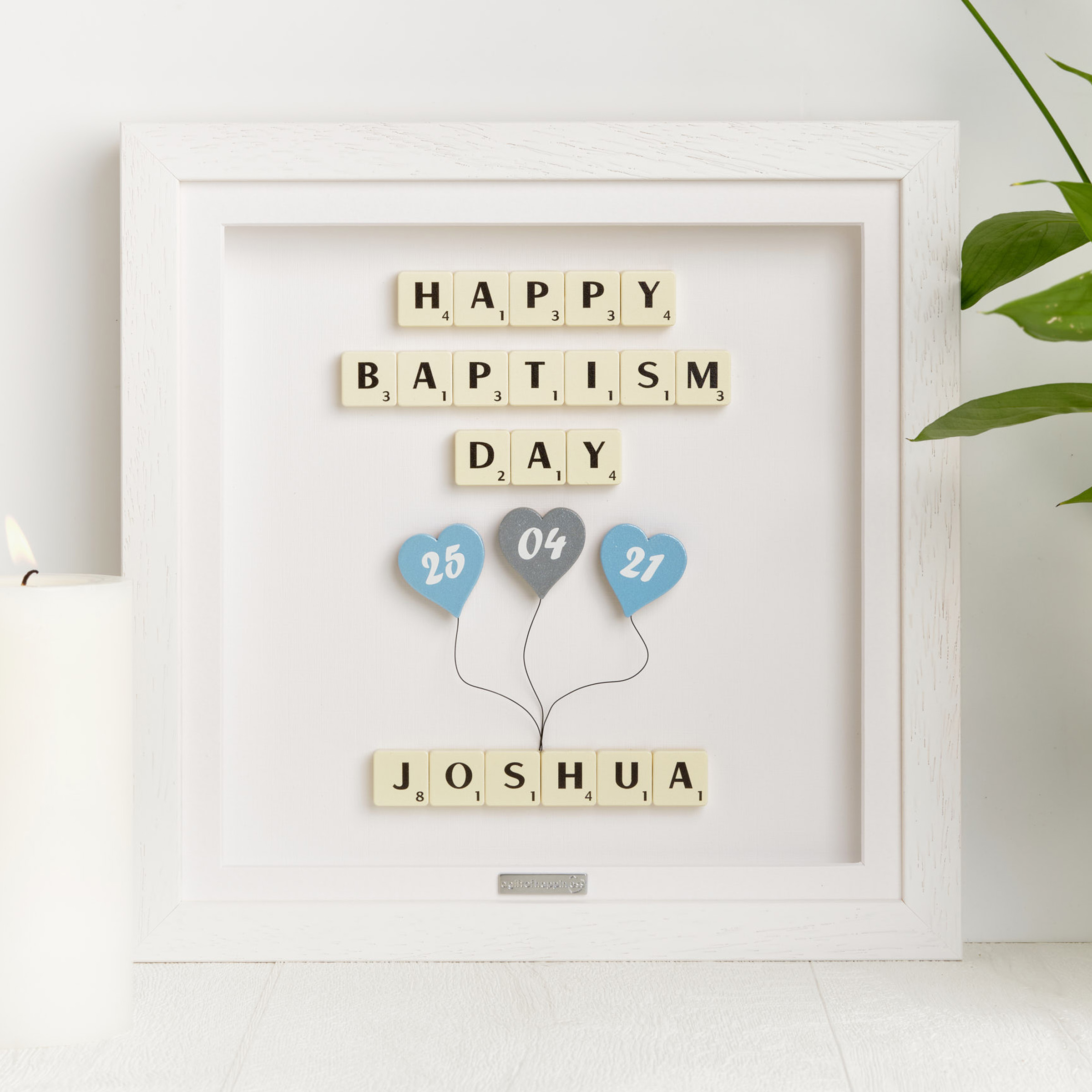Personalised baptism day frame with Scrabble tiles and blue heart balloons showing date and baby name