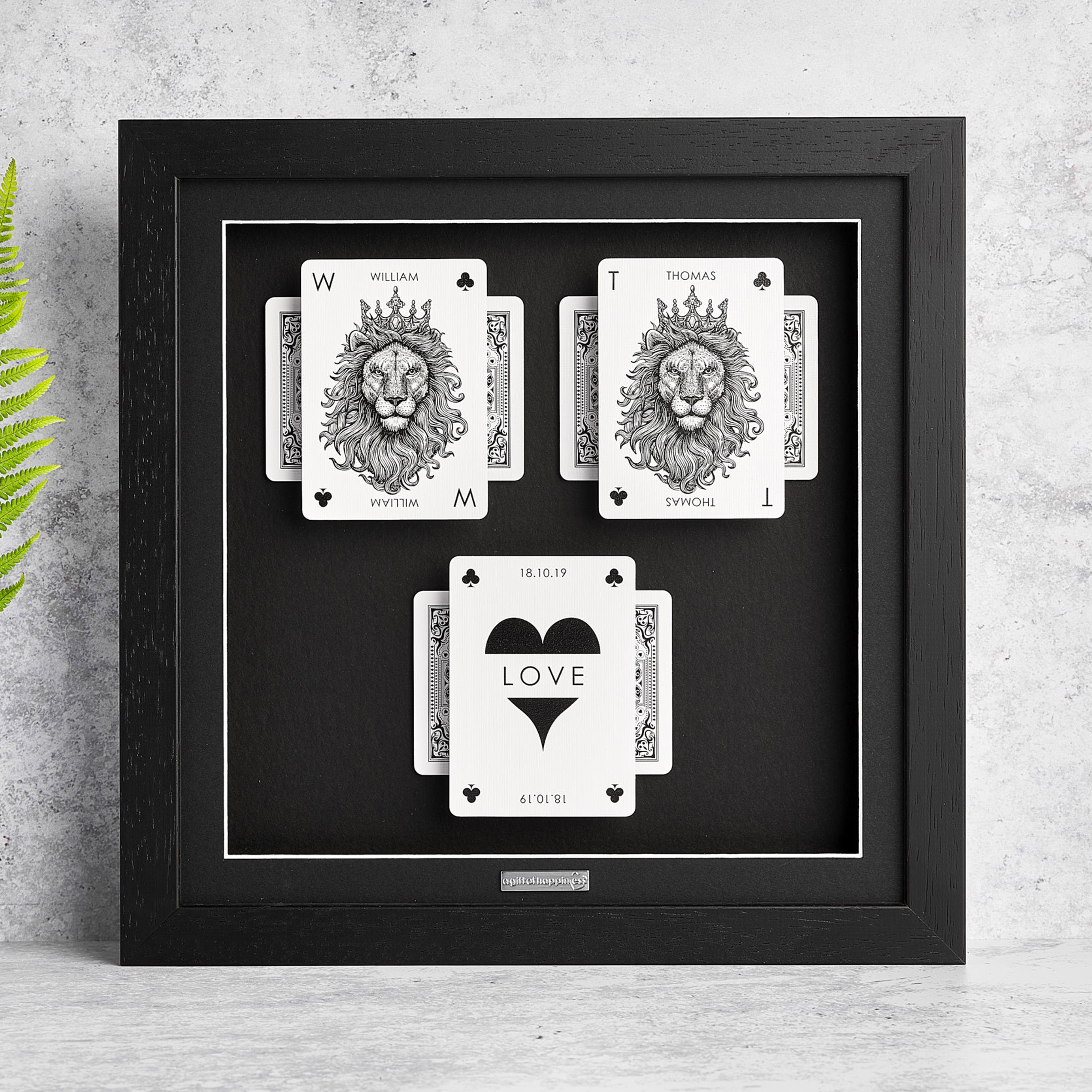 Personalised playing card couples frame with a two lion design and love heart card in black frame