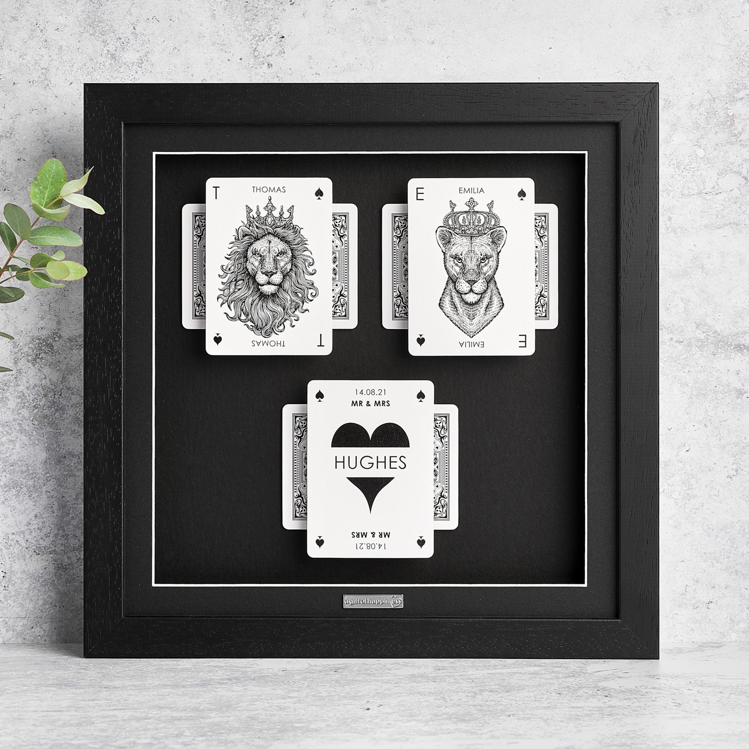 Personalised wedding playing card frame with lion and lioness design and surname card in black frame