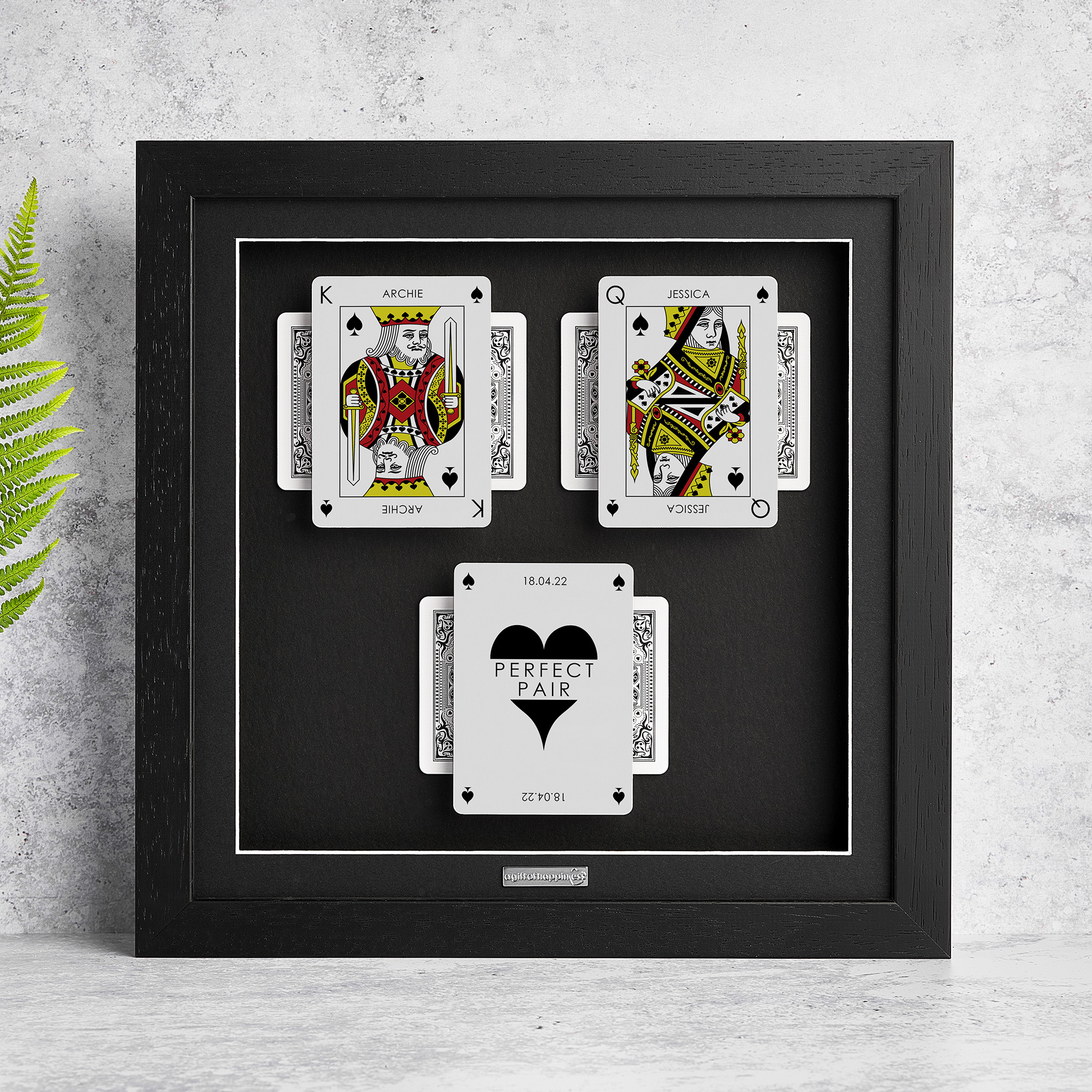 Personalised couples wall art featuring King and Queen playing cards with a milestone occasion and date